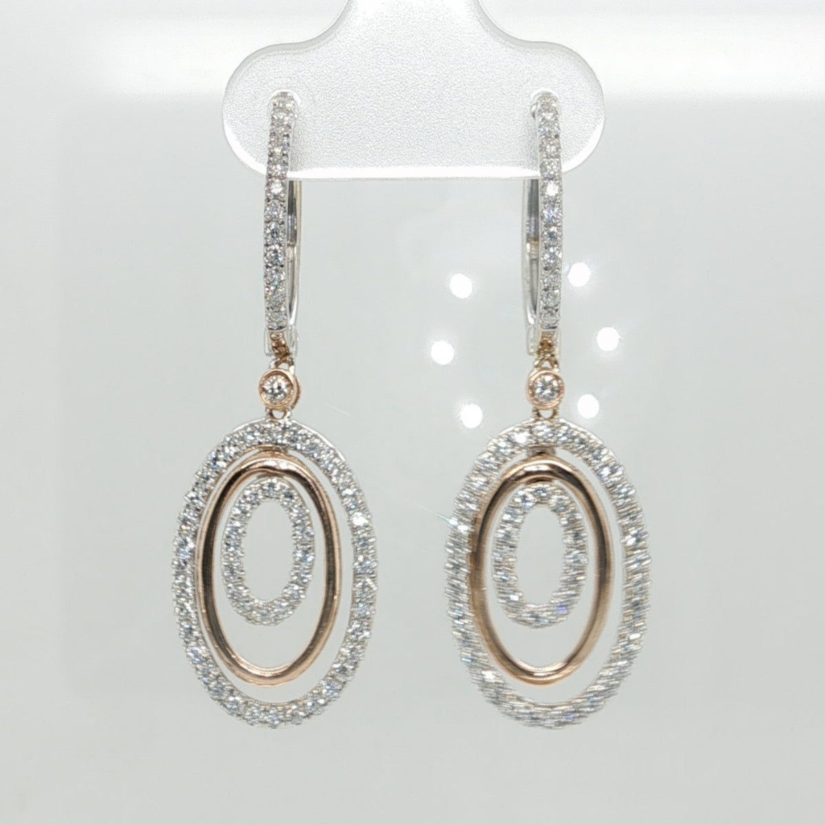 14 kt rose gold and white gold diamond oval dangle earrings