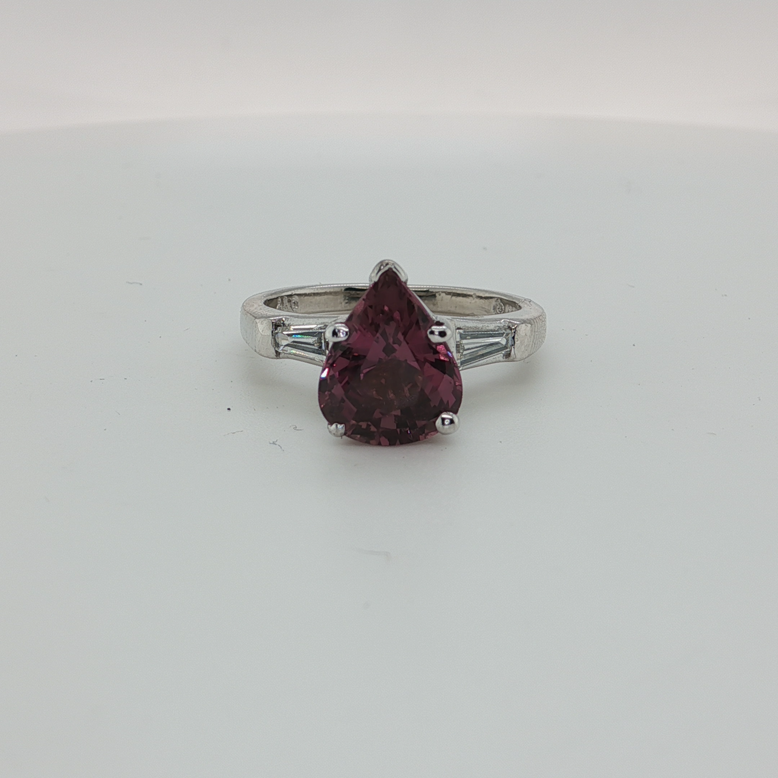 White Gold Ring with Pear Cut Reddish-Purple Garnet