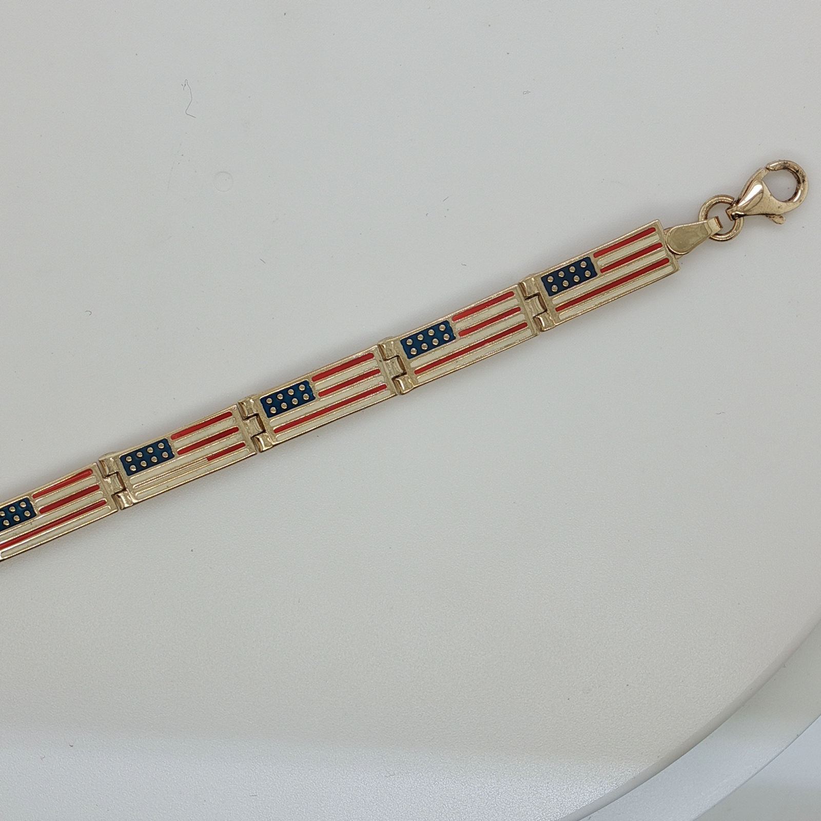 Yellow Gold Chain Bracelet with American Flag Design