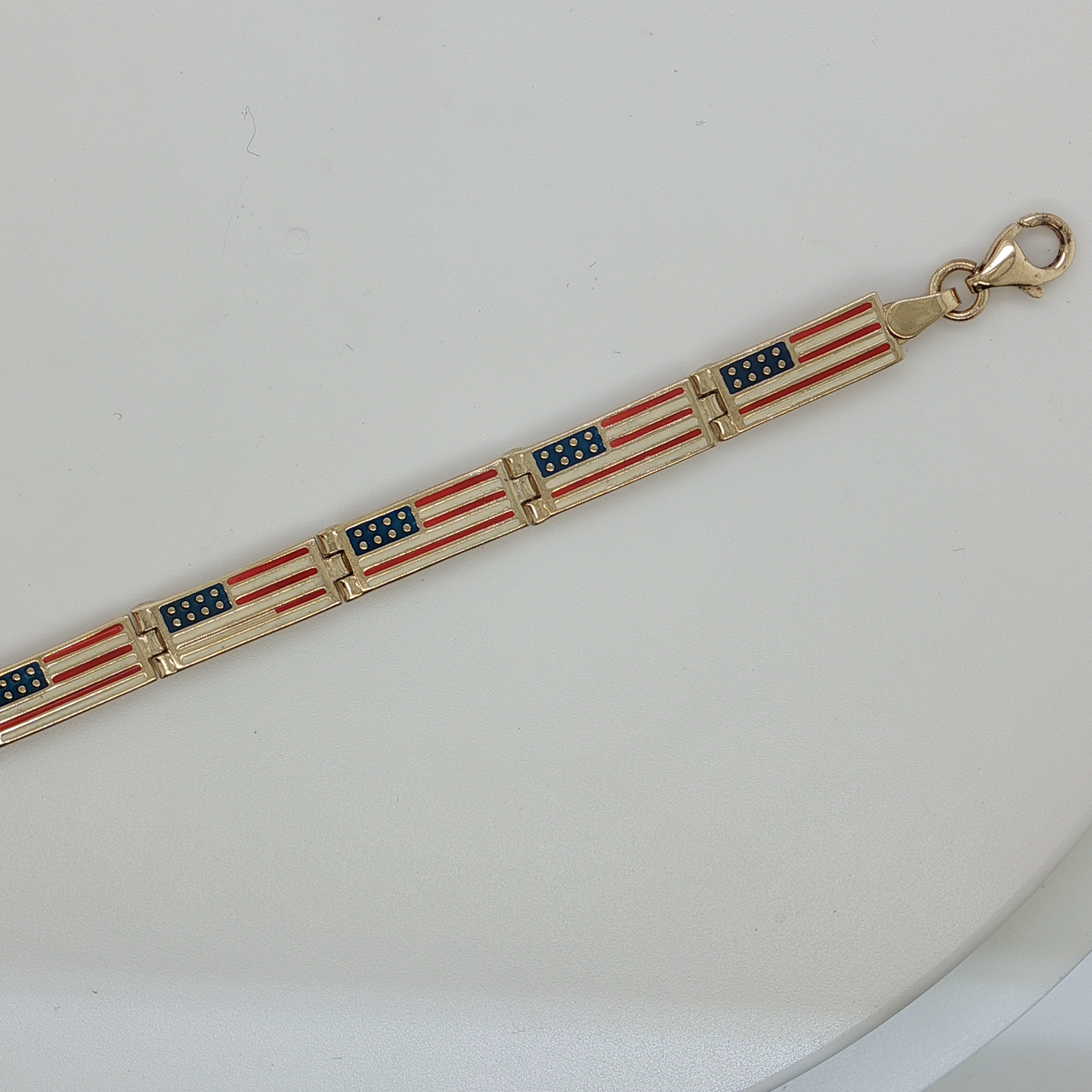 Yellow Gold Chain Bracelet with American Flag Design