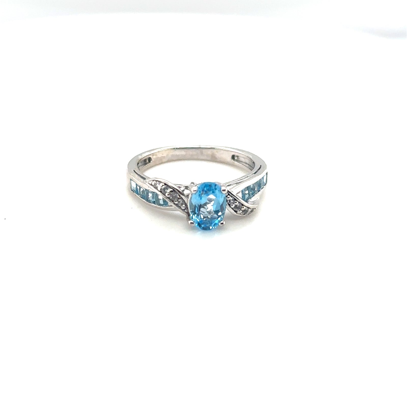SS OVAL BLUE TOPAZ RING W/ WHITE + BLUE STONE SWIRL ACCENTS, SIZE 7
