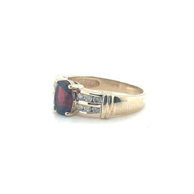 10k Yellow Gold Multistone Ring Featuring an Oval Garnet