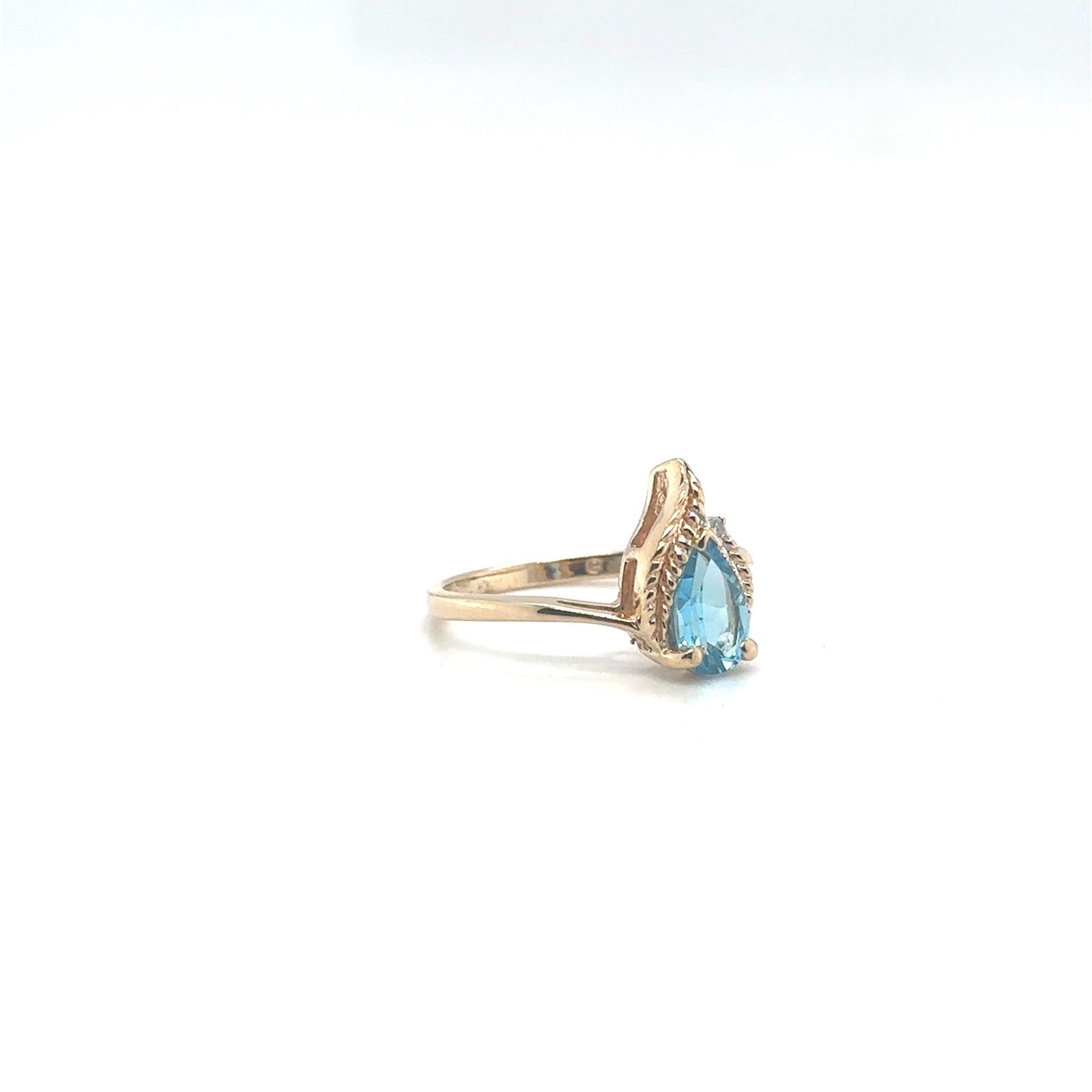10K Yellow Gold Pear Shape Blue Topaz Ring